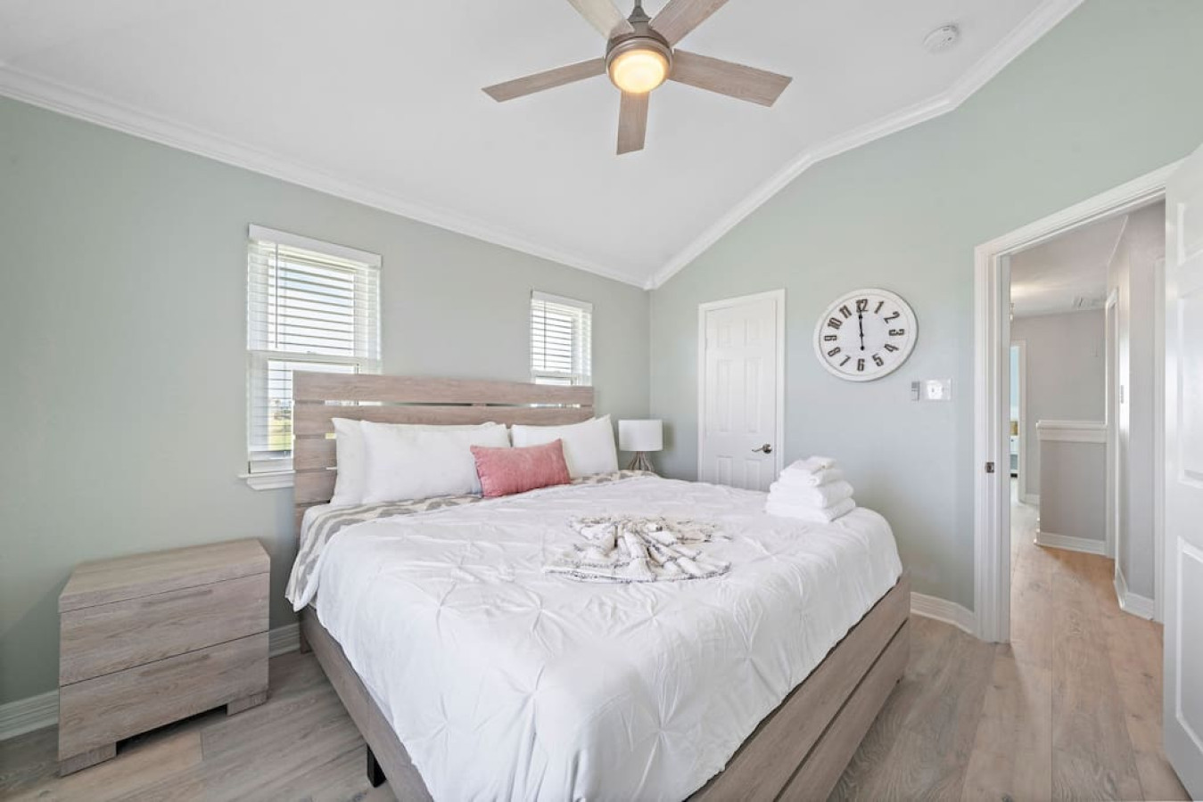 Nature's embrace, the essence of this tranquil bedroom with this king-sized bed