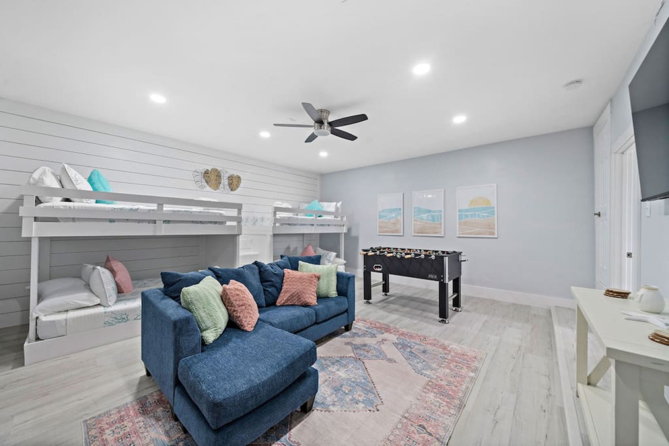 Tranquil vibes and modern comfort on display with 2 sets of double bunk beds