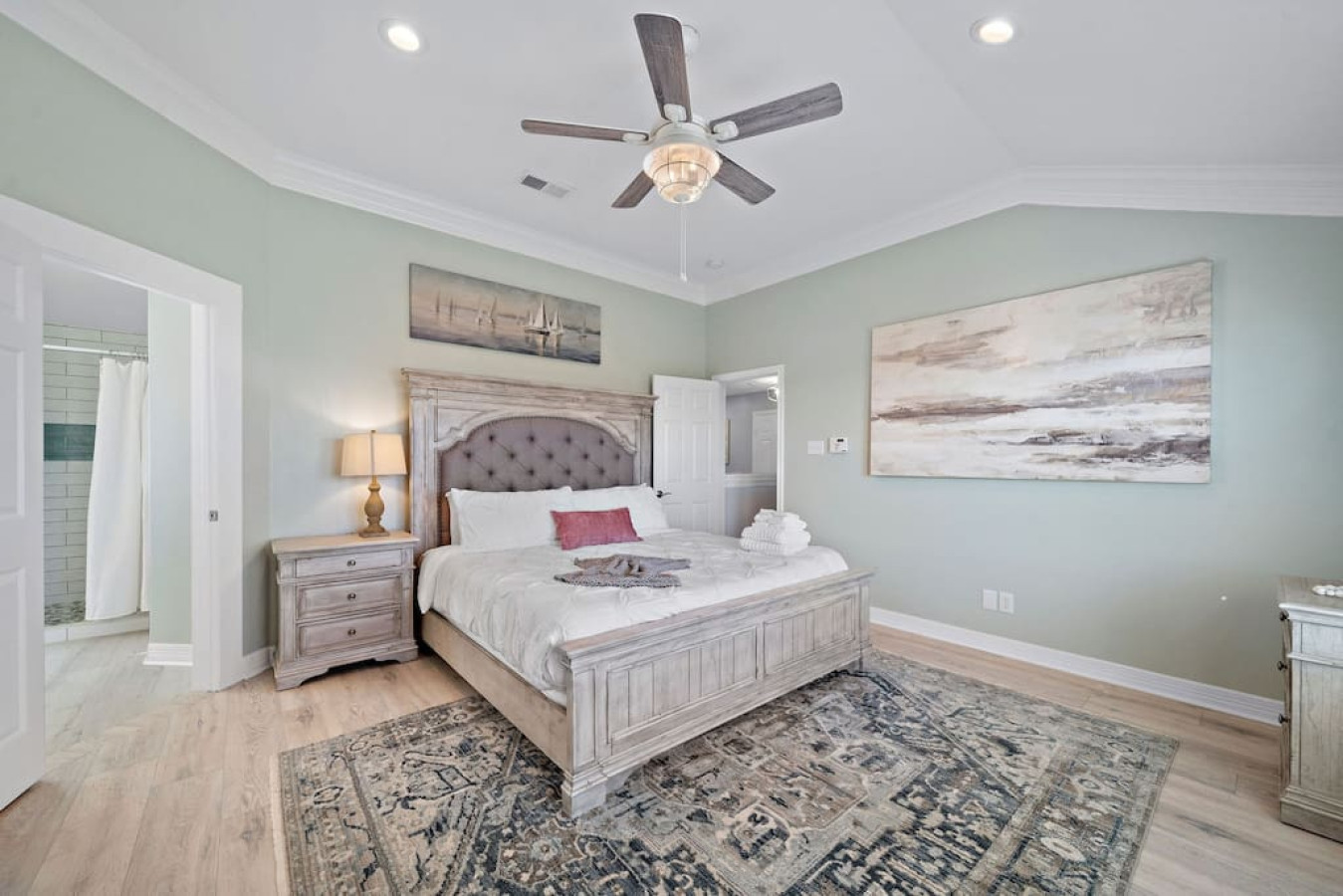 Serenity echoes in every detail of this inviting sleeping space with this king-sized bed