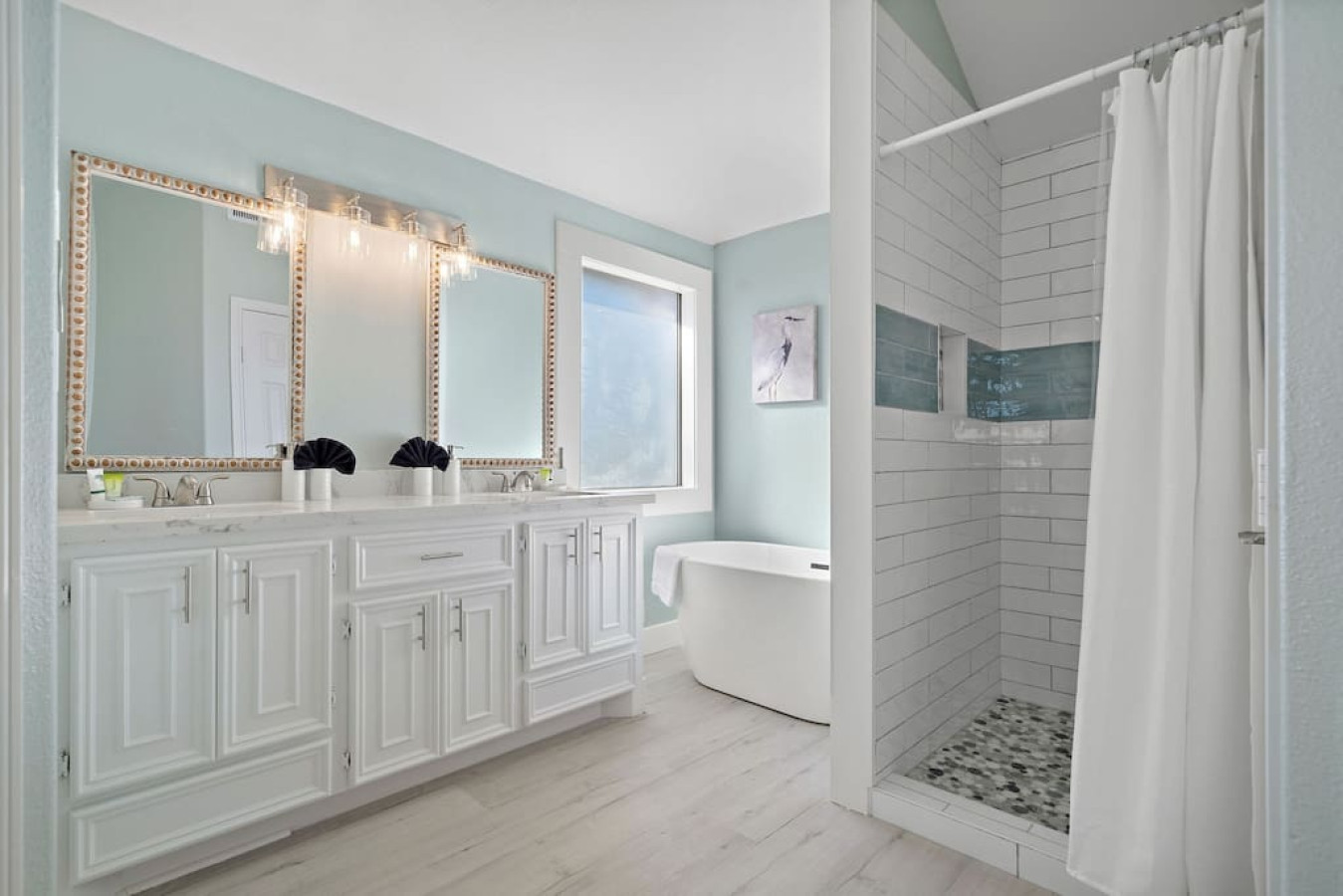 A symphony of open-air elegance defines this inviting bath