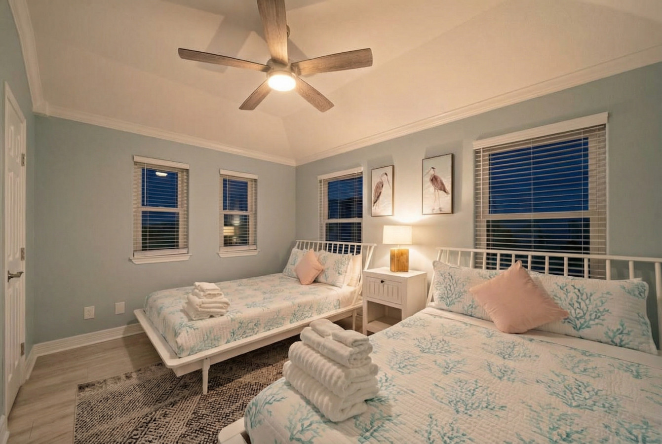 Revel in the modern elegance of this inviting sleeping space with these queen beds