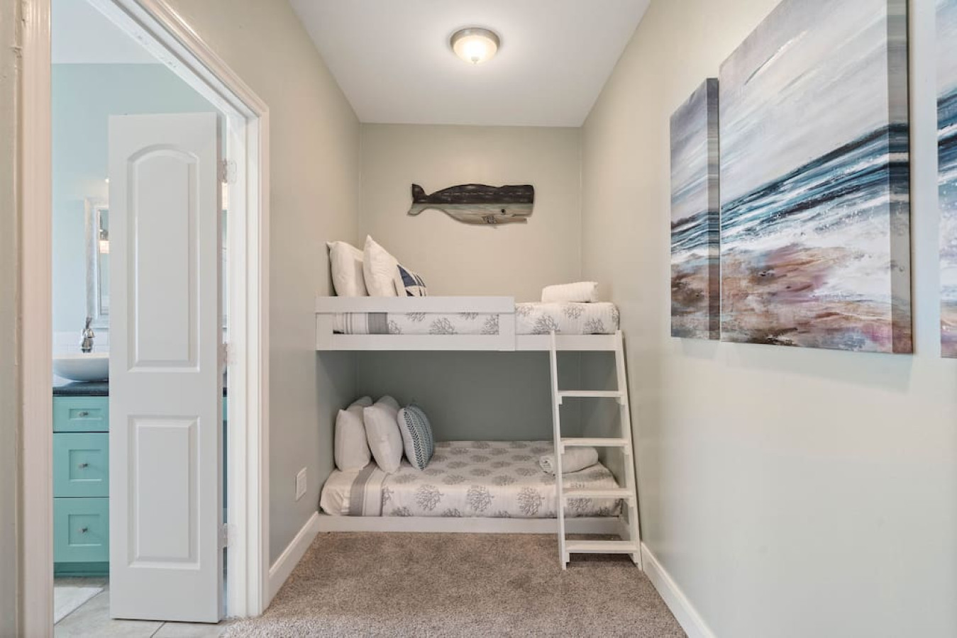 This bedroom has a twin over twin bunk bed