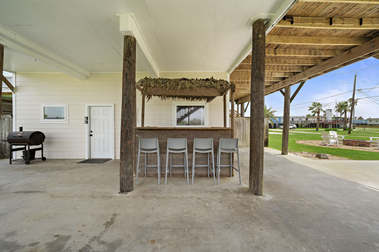 Downstairs is your very own tiki bar!