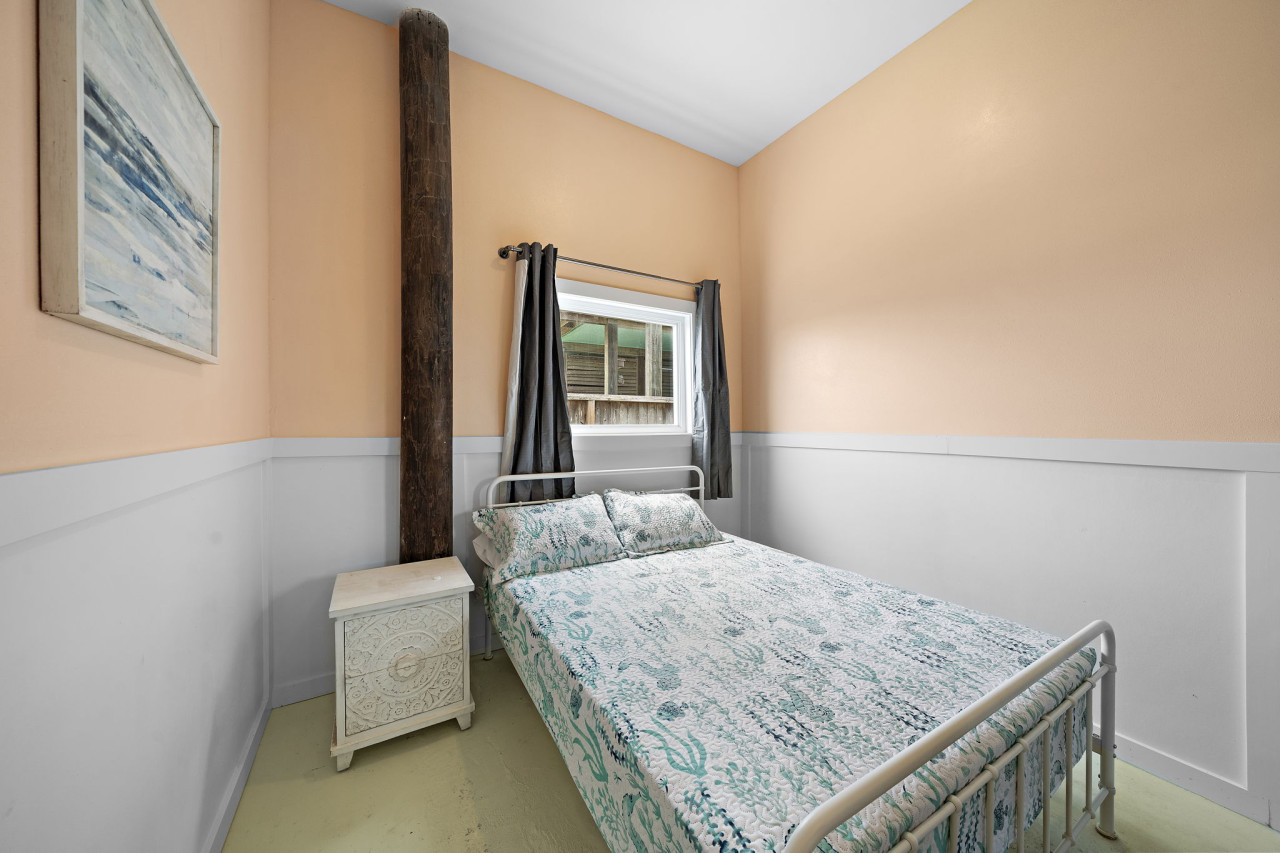 The game room has a queen sized bed