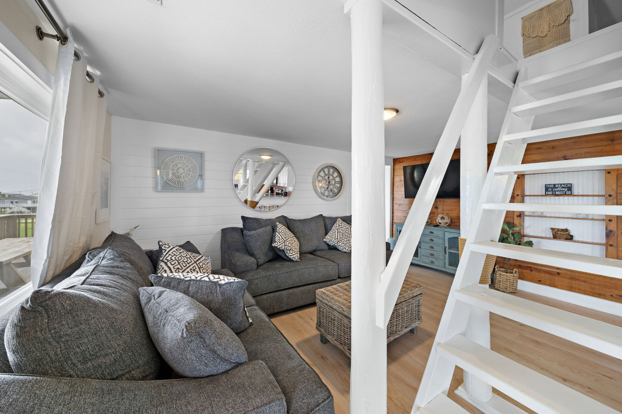 Curl up with a good book in the inviting living room