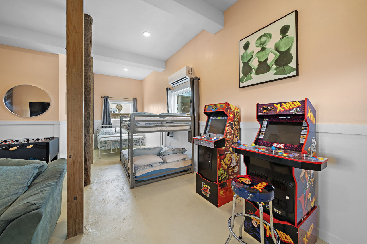Queen and full-over-full bunk in the downstairs game room