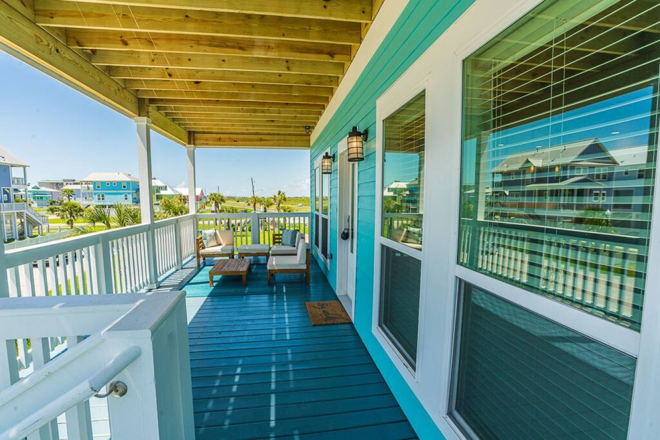 Relax and rejuvenate on this inviting porch oasis