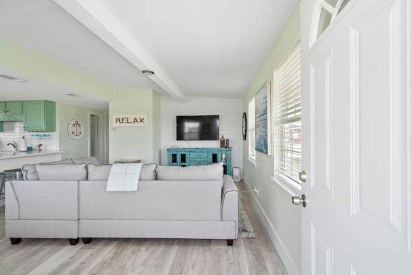 Curl up with a good book in the inviting living room