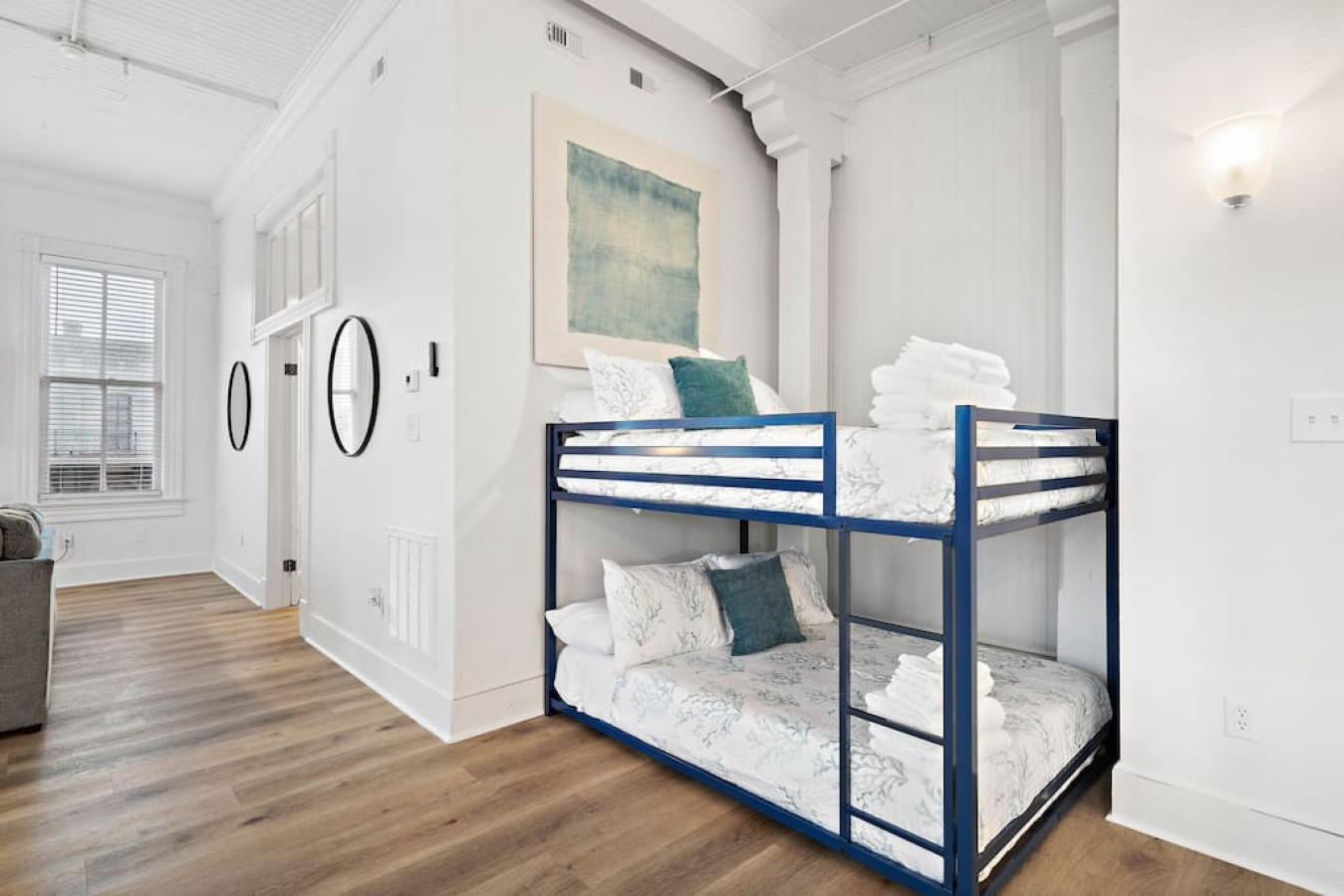 A full-size bunk located off the living room