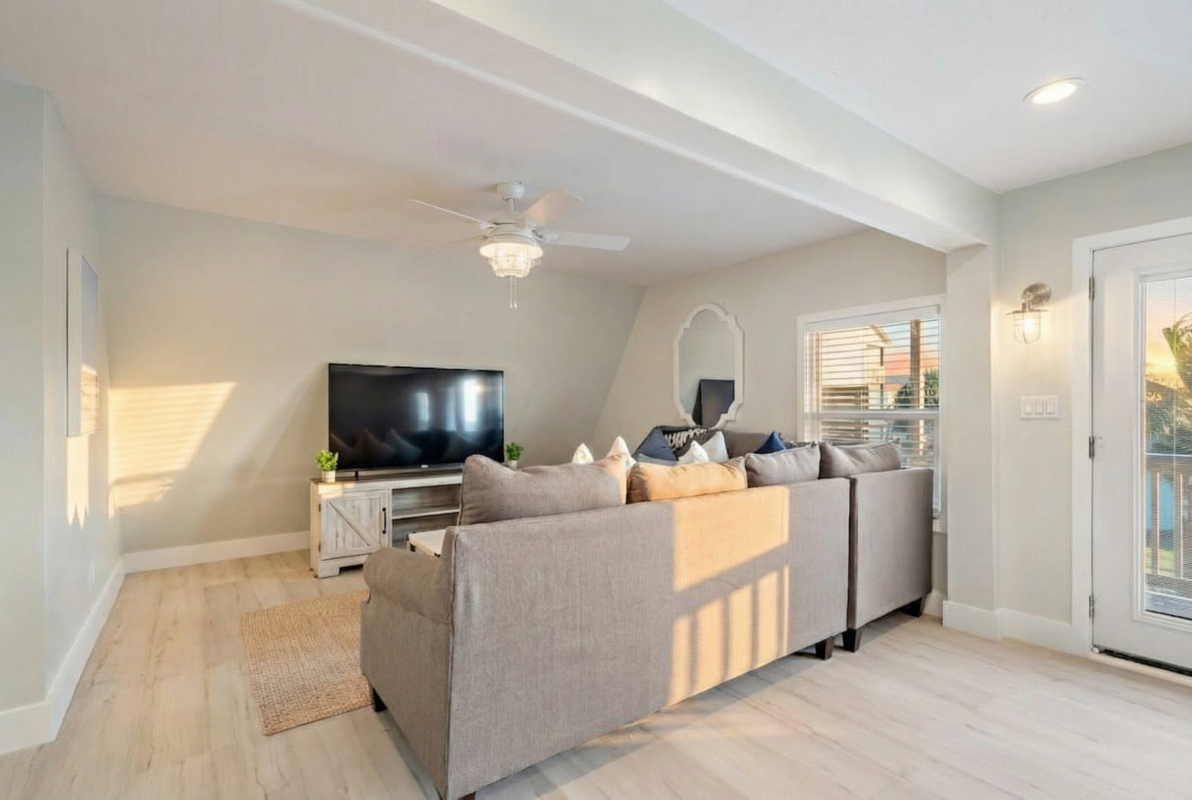 The living room is the perfect place to unwind after a fun day at the beach