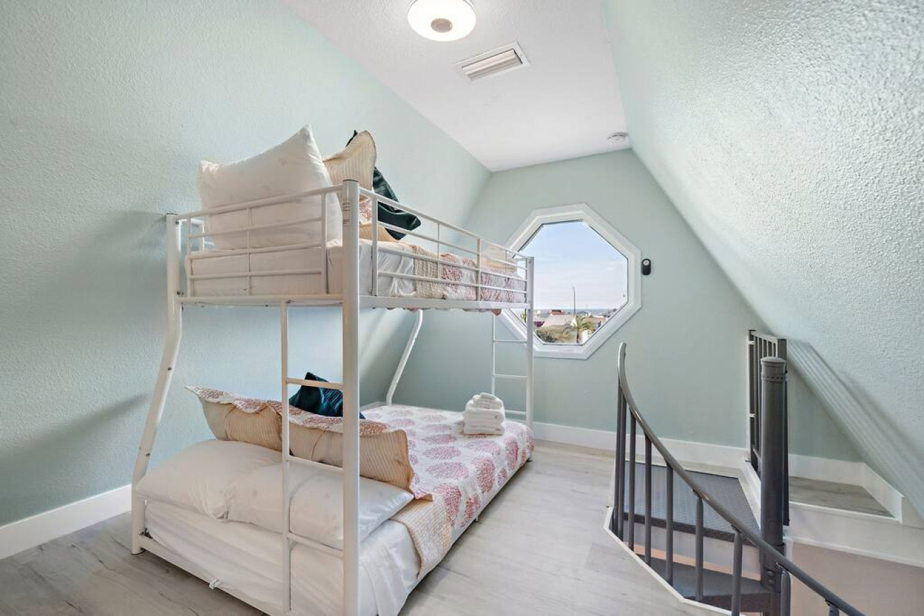 Serene escape from the world with this twin/twin bunk bed