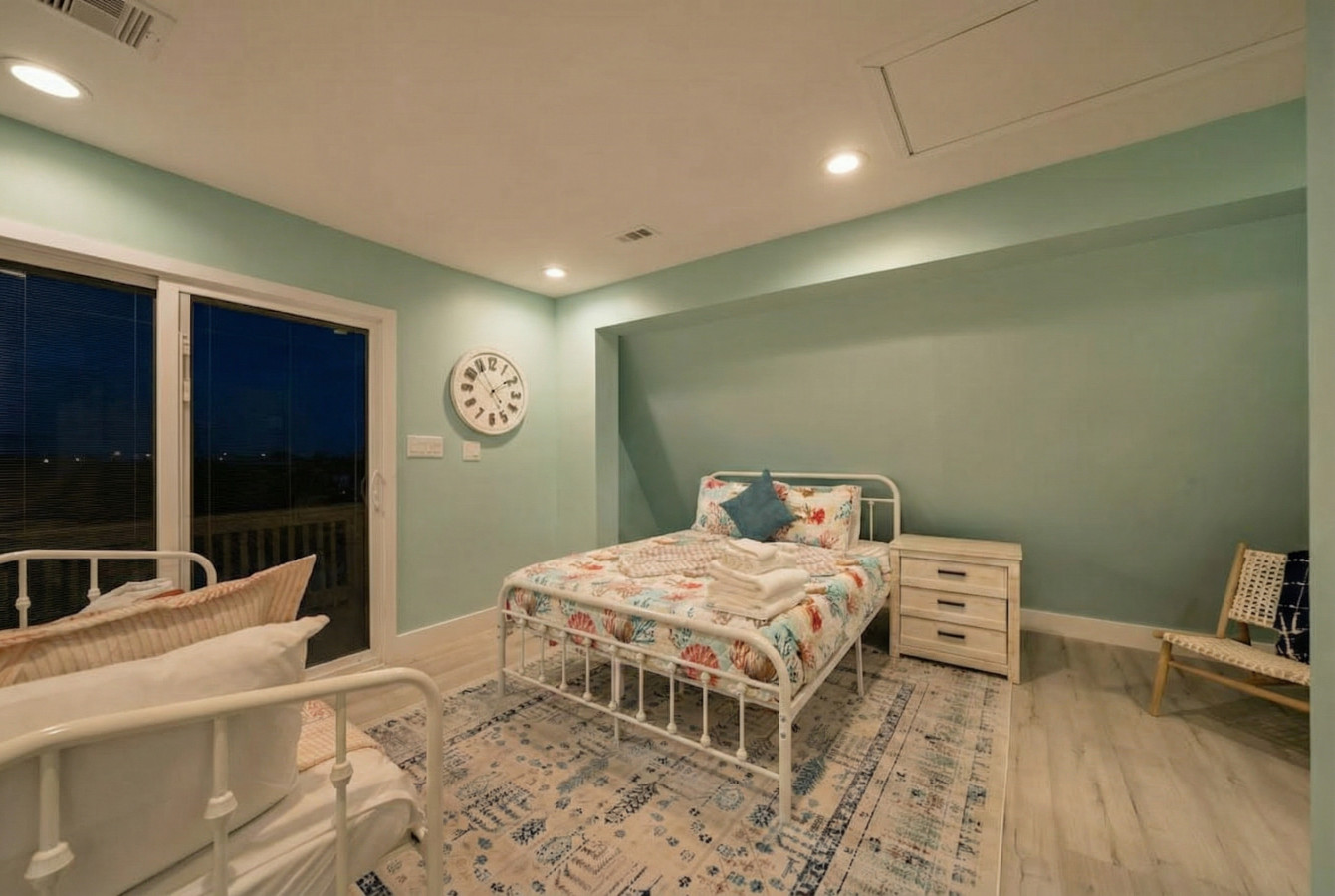 Nest of relaxation and rejuvenation with a queen bed and a twin daybed