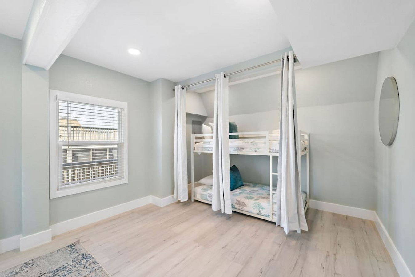 The two bunk beds are perfect for children and it also has a privacy curtain