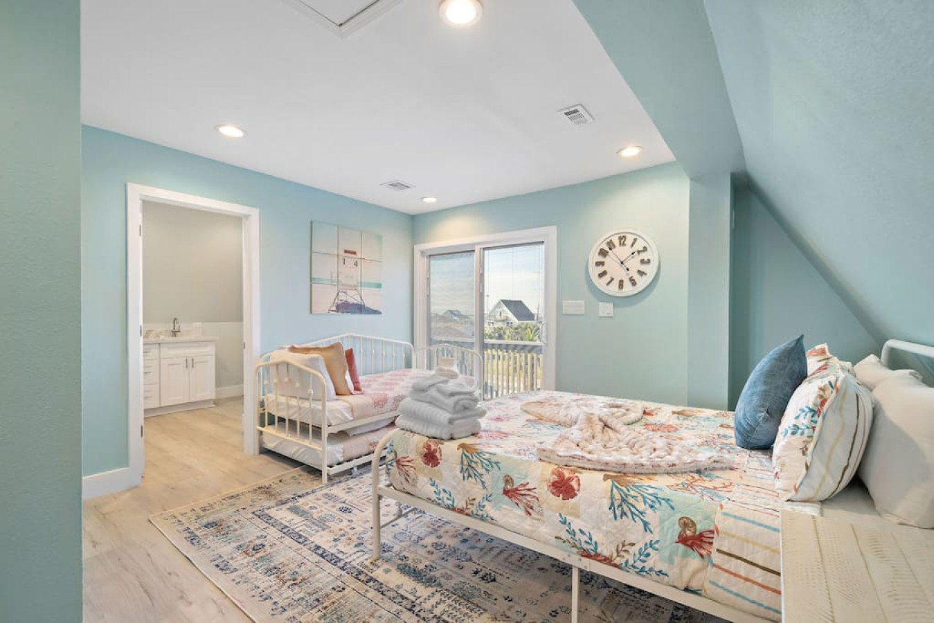 Where the worries of the day melt away with a queen bed and a twin daybed