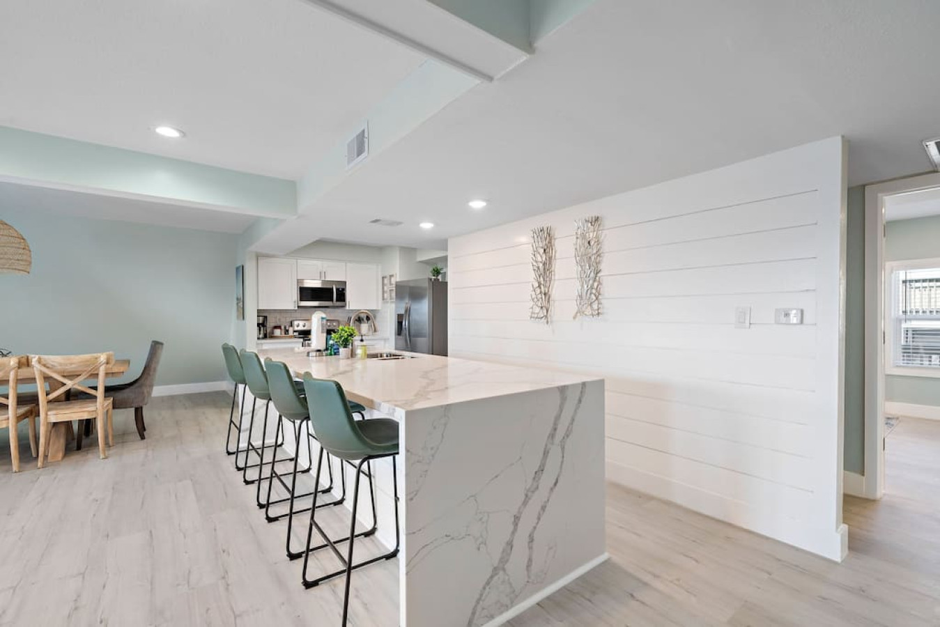The beautiful kitchen island is great for breakfast in the morning