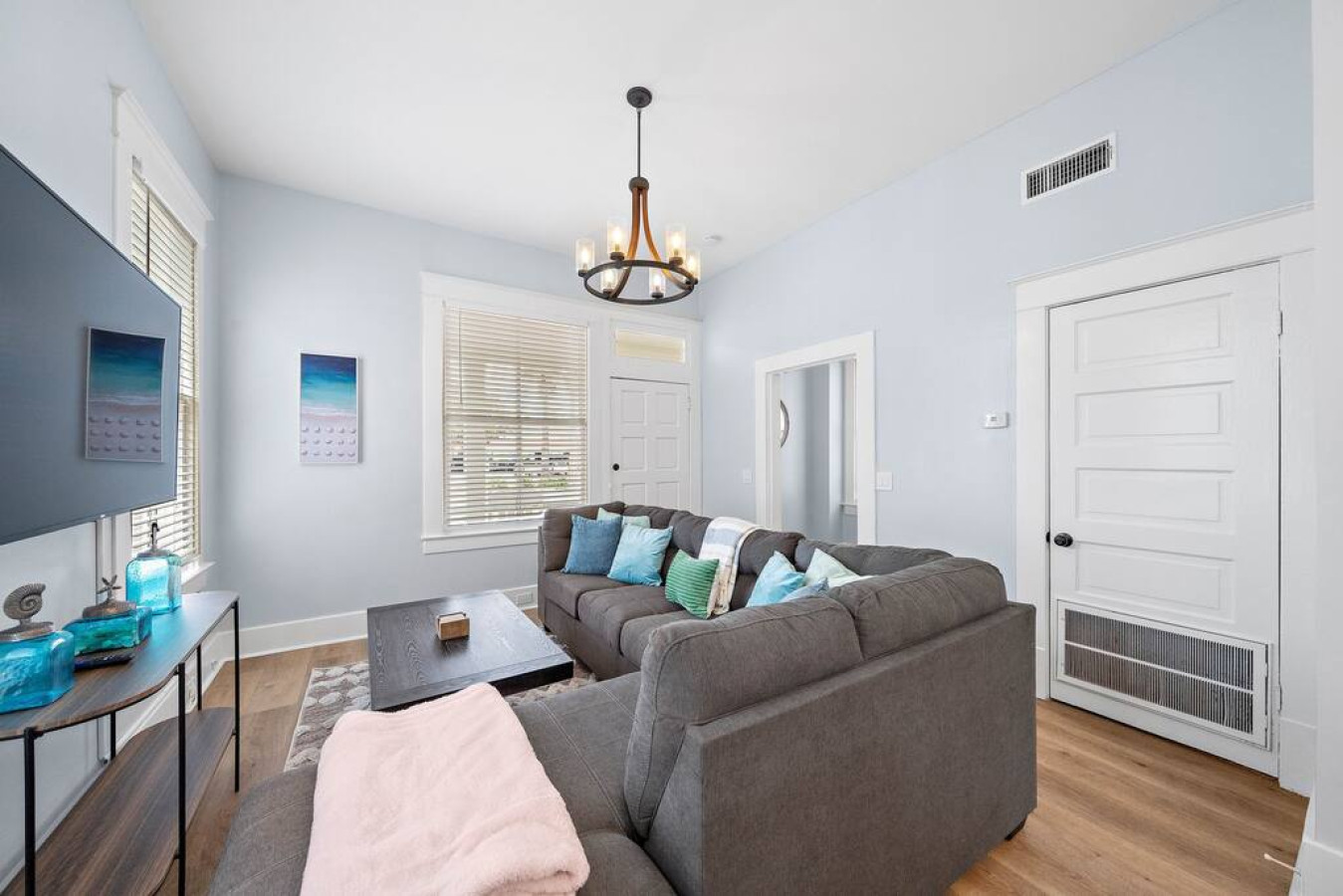 Curl up with a good book in the inviting living room