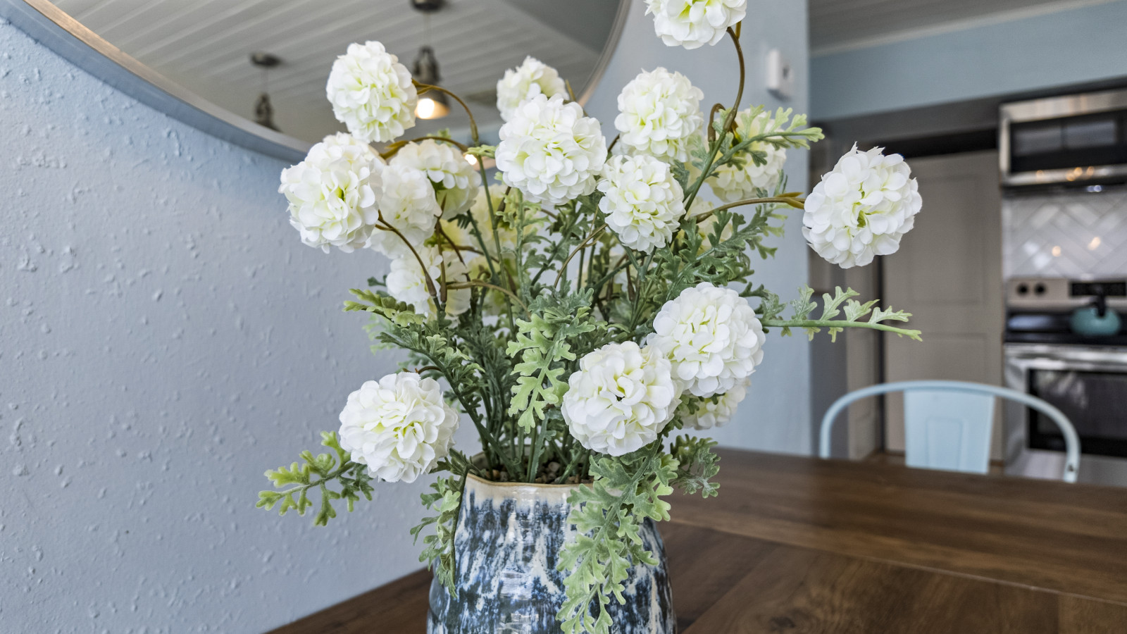 Fresh accents bring a light, airy feel to the space