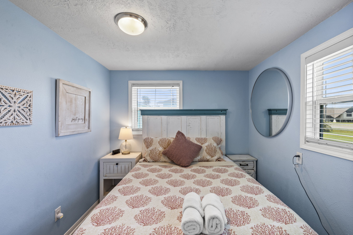 This bedroom has a queen-sized bed