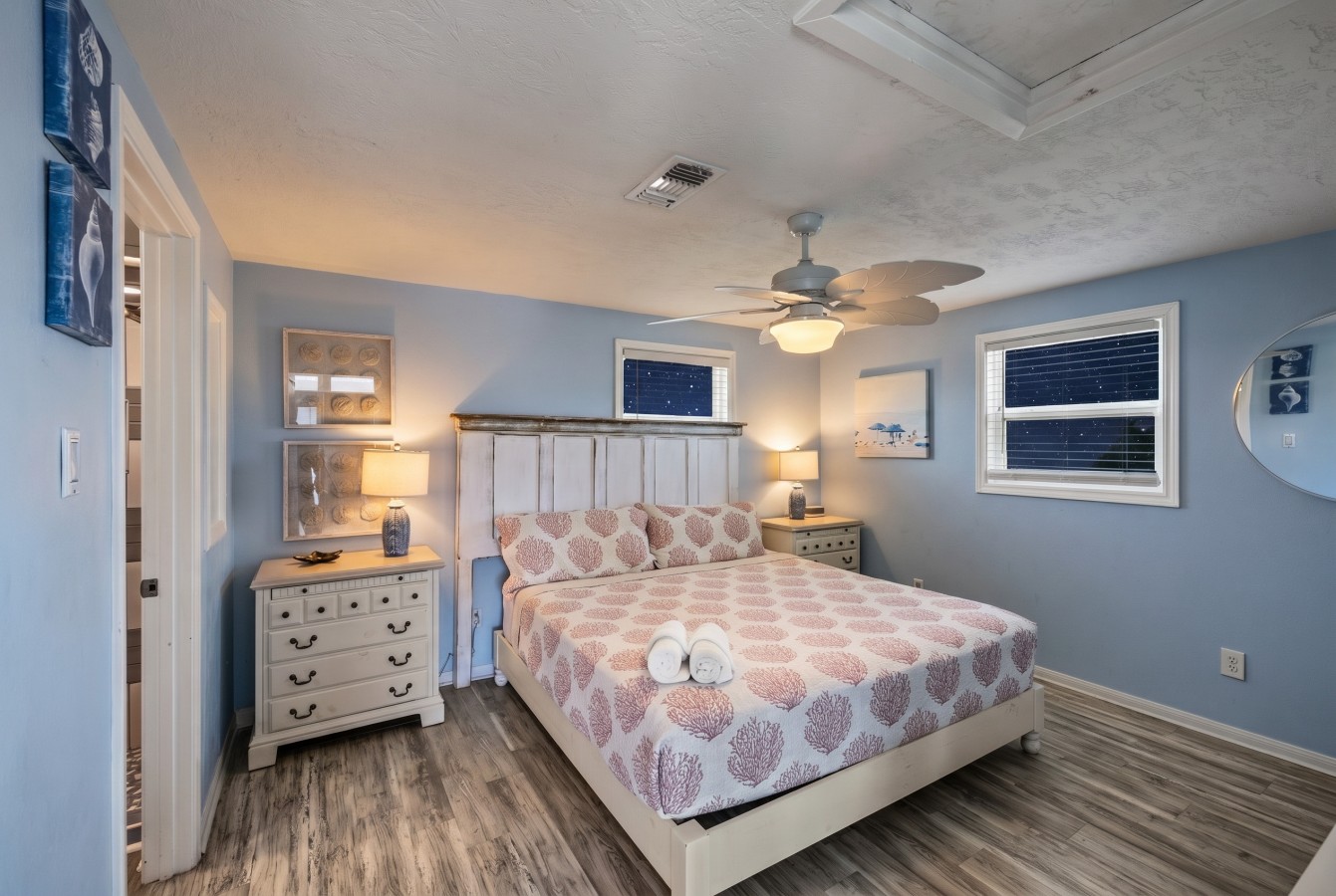 Relax in this serene, coastal-inspired bedroom
