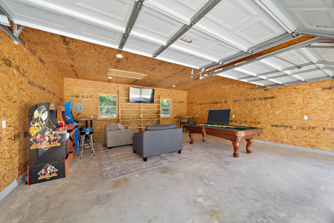 Enjoy this game room with a variety of games