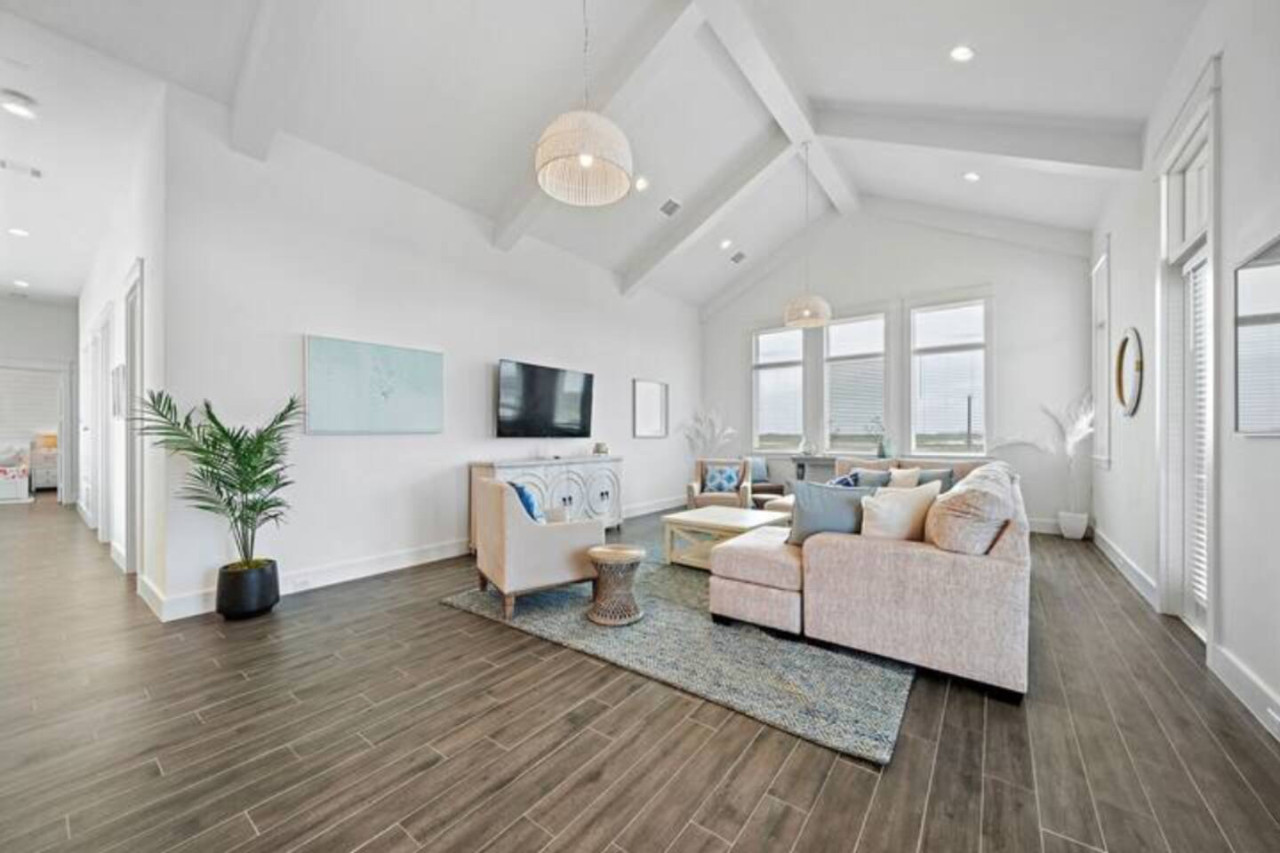 Curl up with a good book in the inviting living room