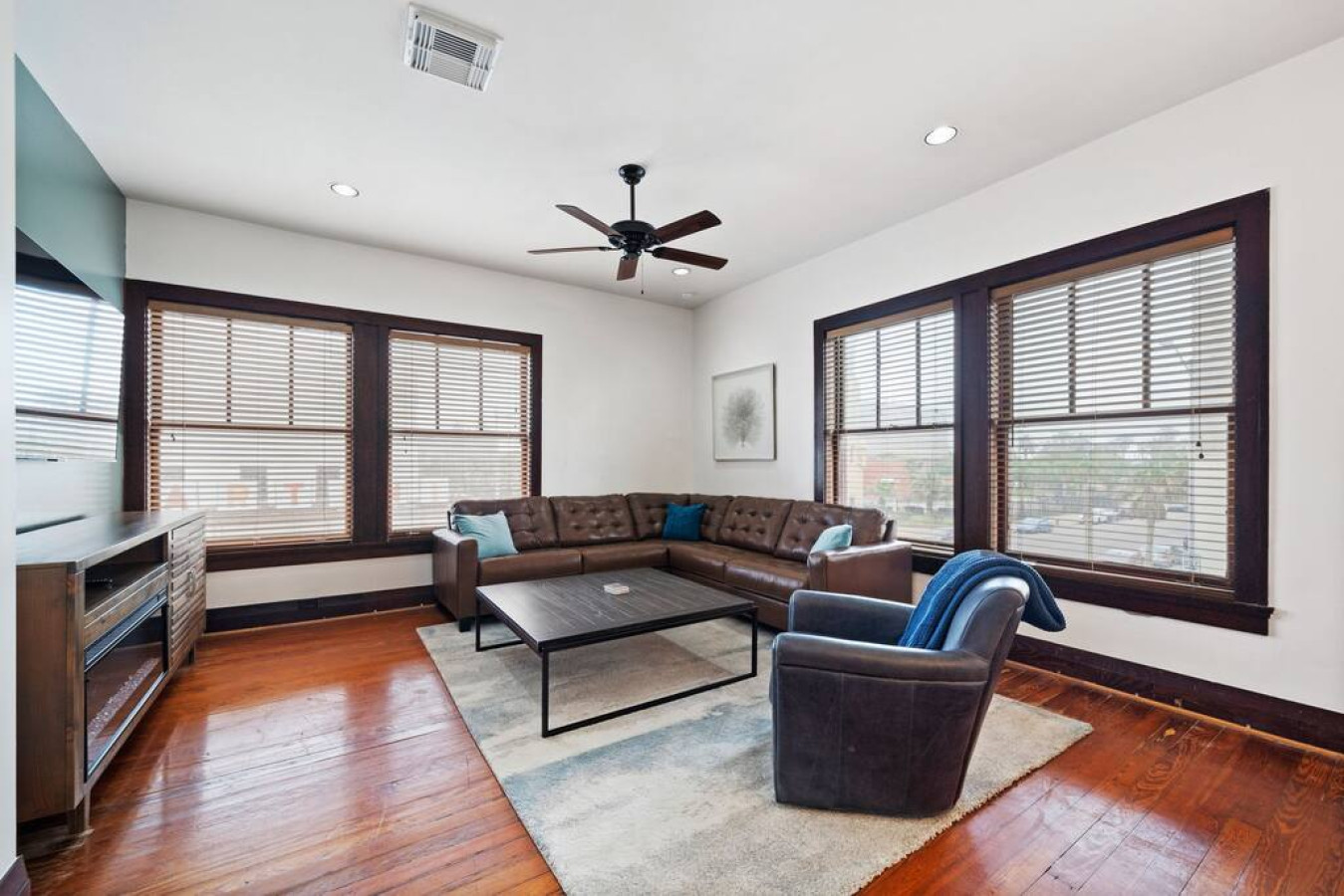 Curl up with a good book in the inviting living room