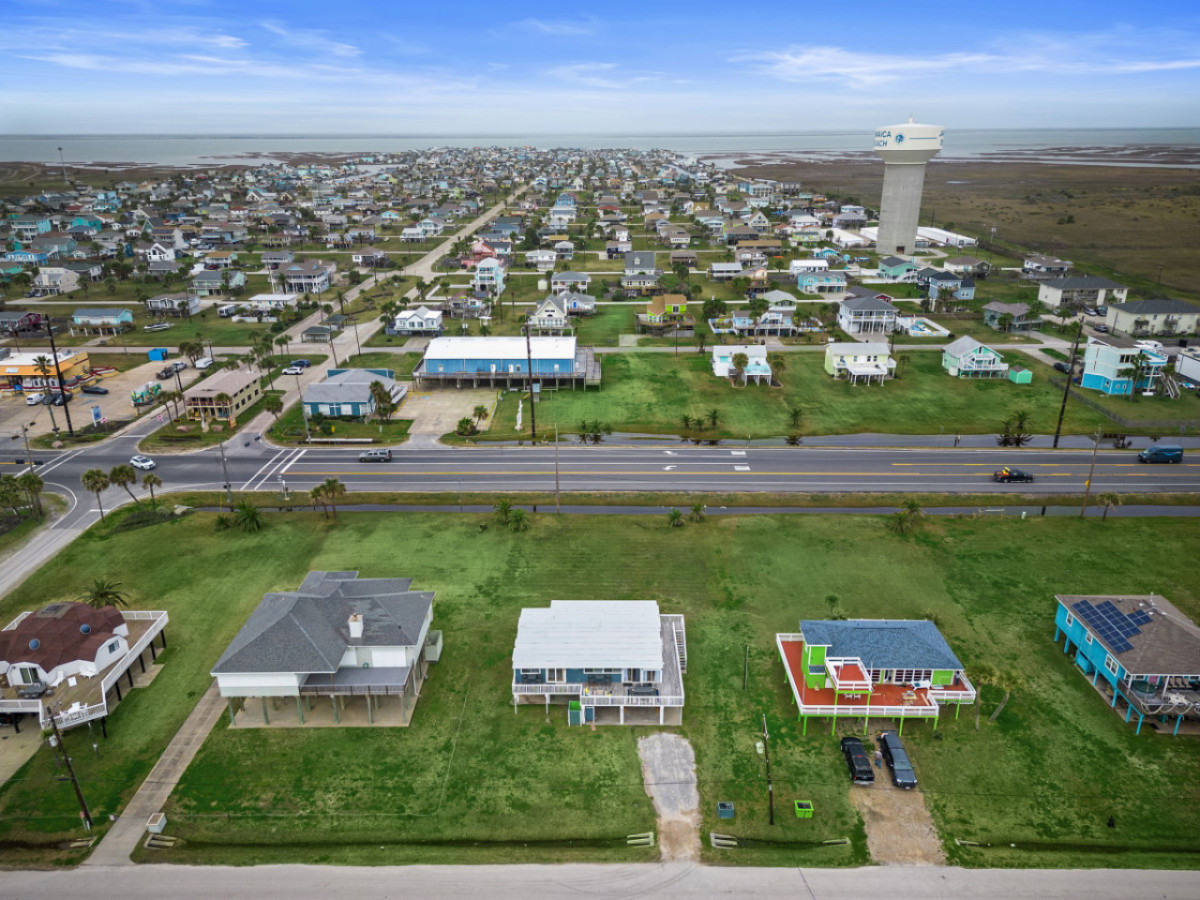 Embrace the serene tranquility of coastal living, where comfort meets the endless horizon