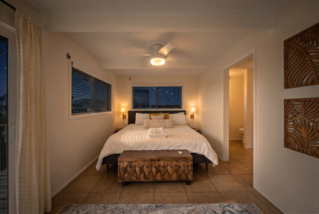 Where sleep unfolds in contemporary comfort with a king-sized bed