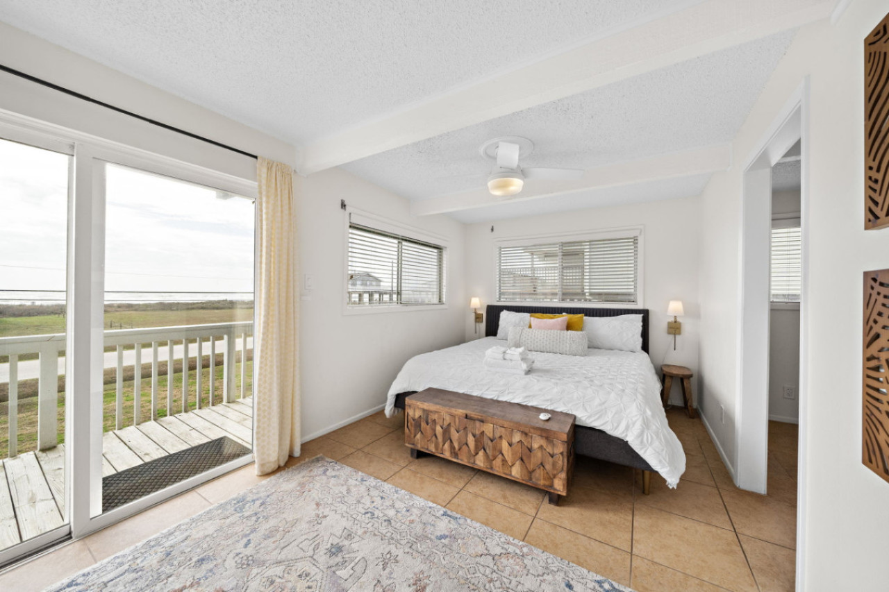 Inviting warmth envisioned in every corner of this king-sized bedroom