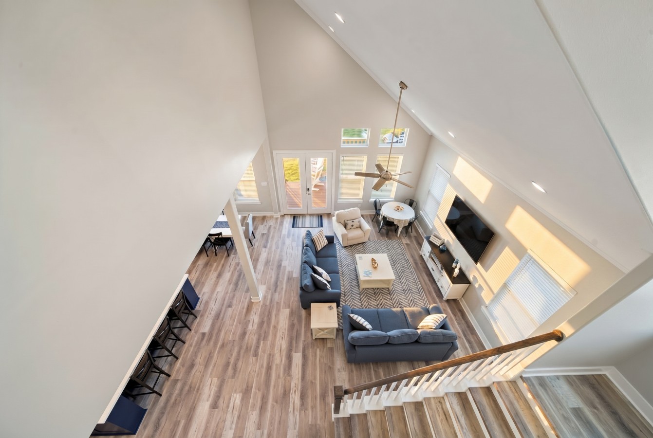 Opening the first floor up to the second floor allows for the tall ceilings