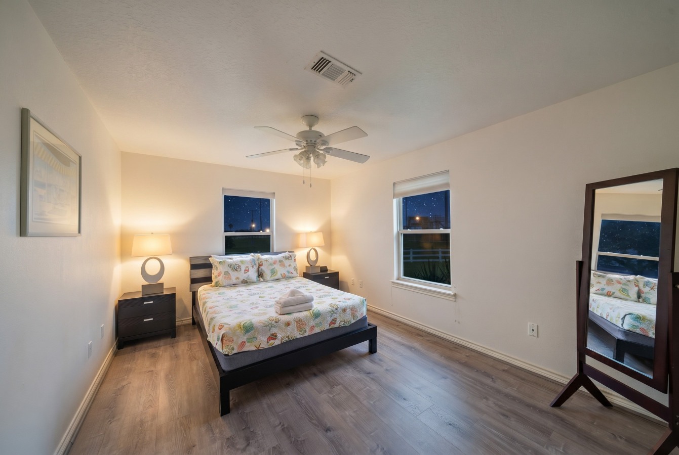 This bedroom has a queen size bed