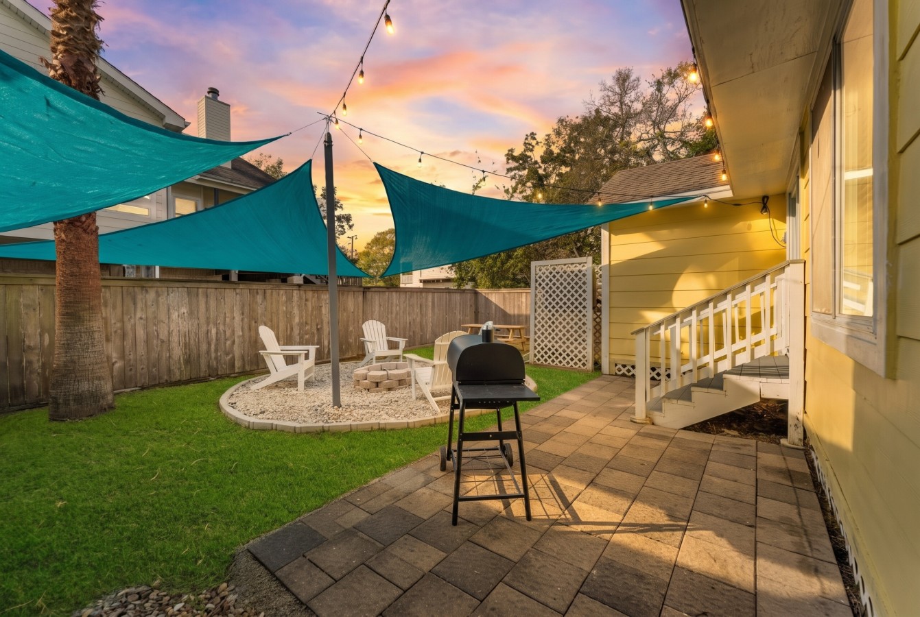 Grill up a feast on the back patio with the BBQ pit