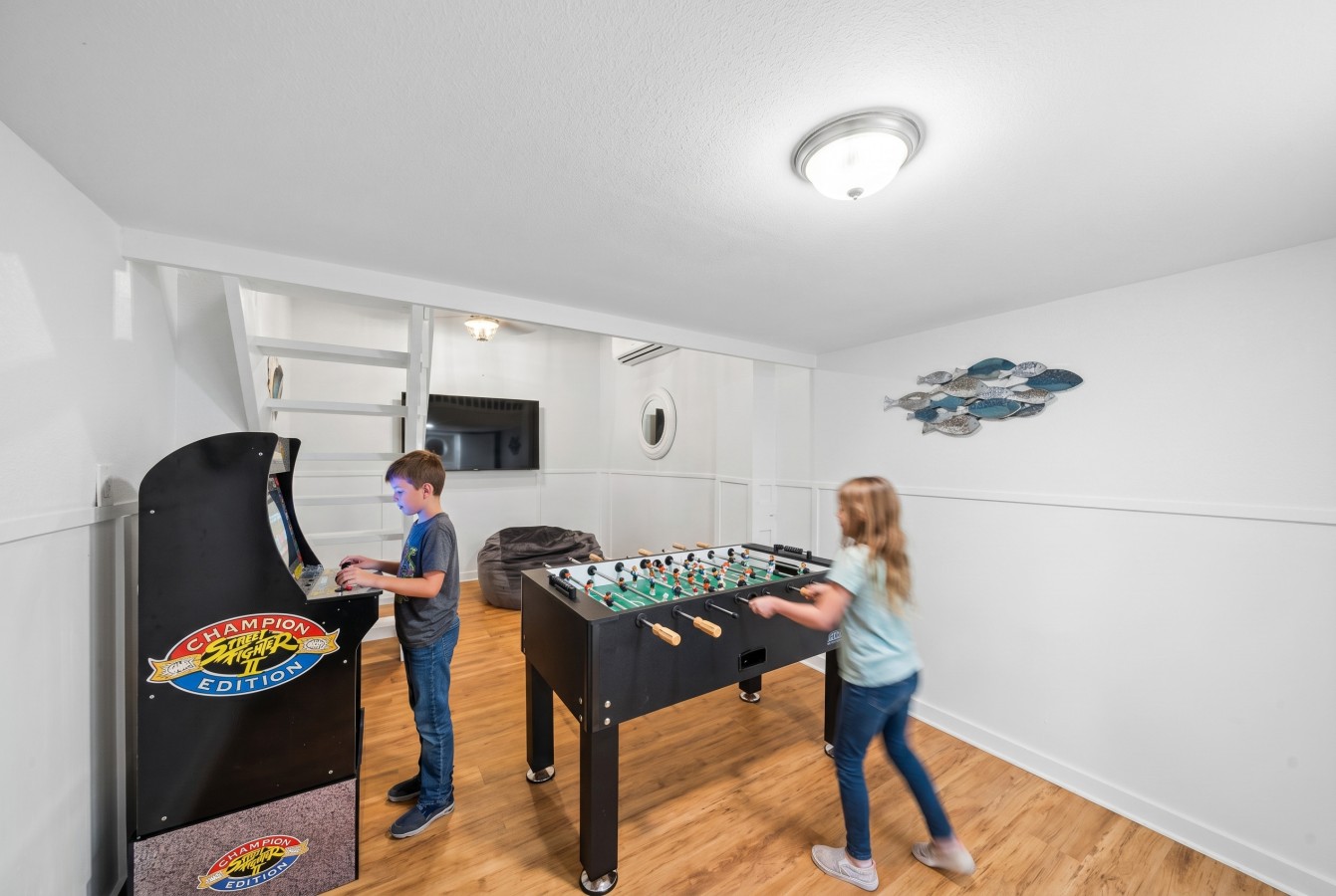 Enjoy this game room with a variety of games