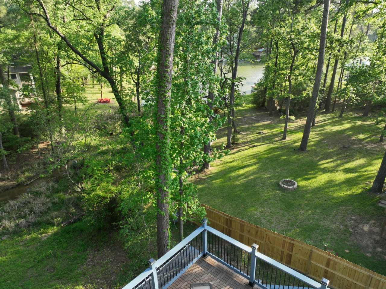 The huge rooftop deck overlooks the lake cove