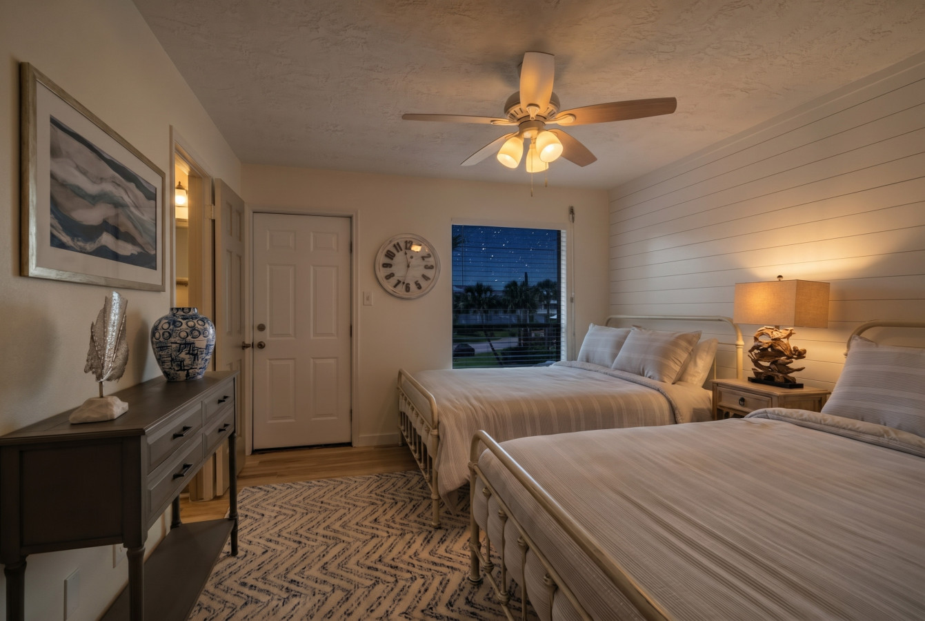 This bedroom has two queen sized beds