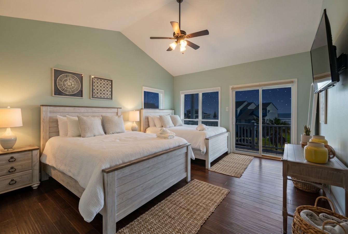This bedroom has 2 queen sized beds
