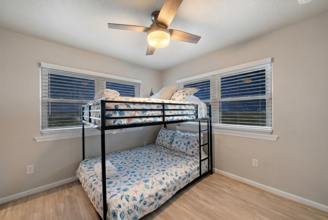 This bedroom has a full-over-full bunks