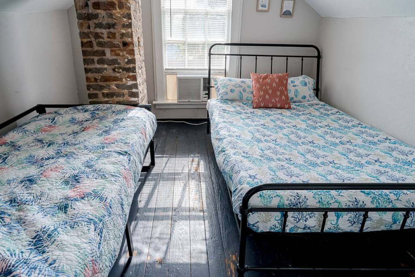 This bedroom has a full bed and a day bed