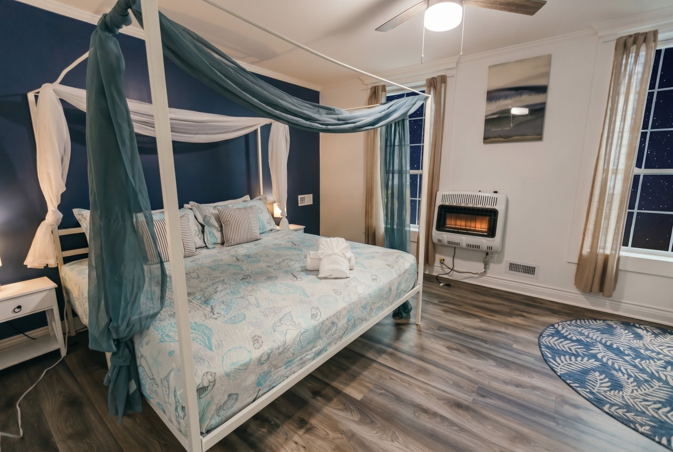 This spacious bedroom offers a relaxing retreat after a long day