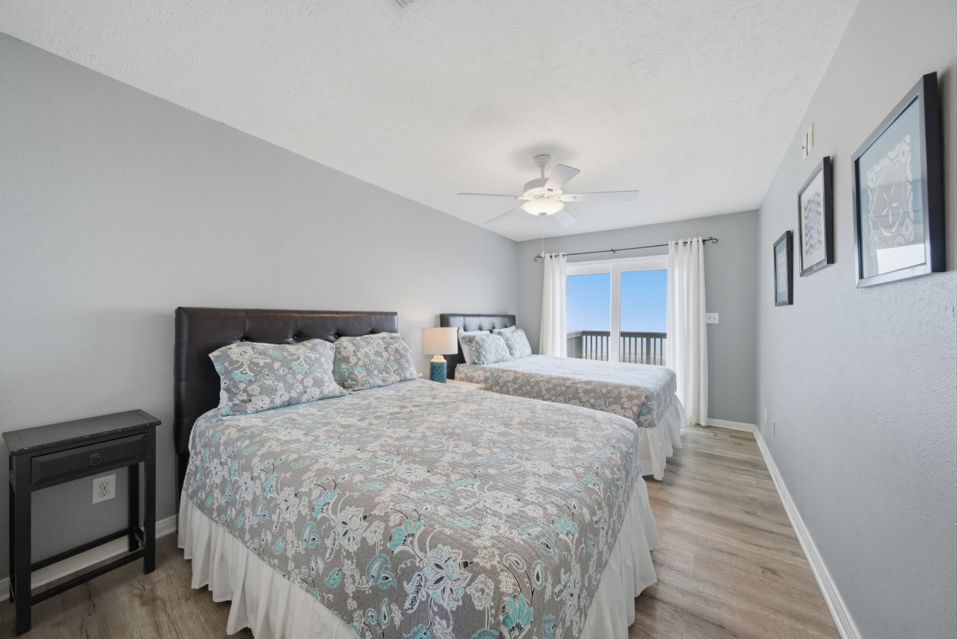 This bedroom has 2 queen beds
