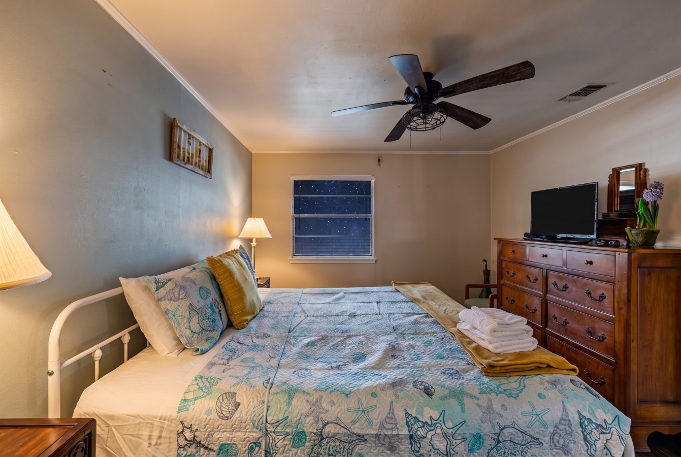 Relax & recharge in this inviting bedroom