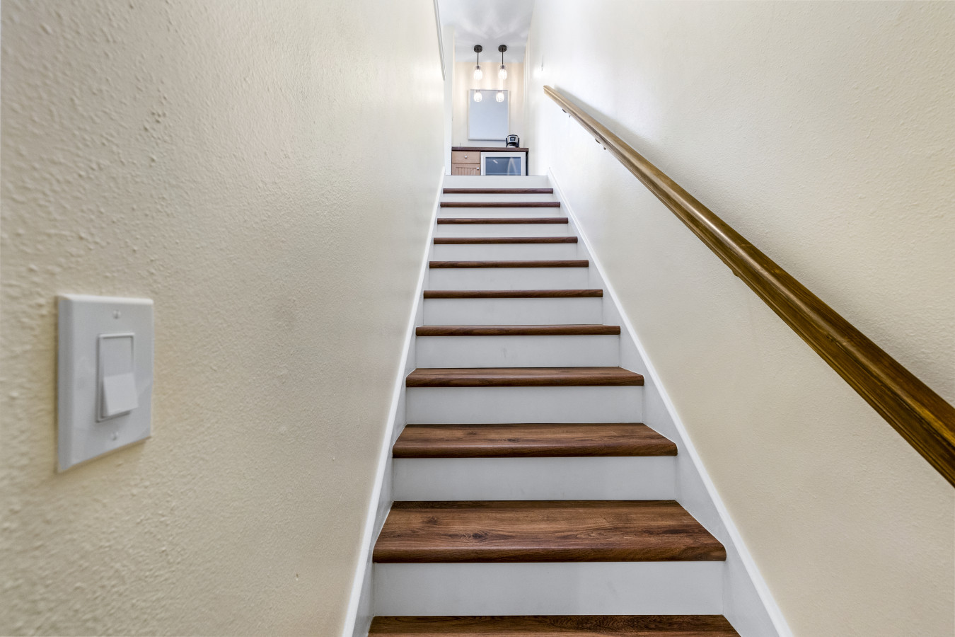 Interior staircase connecting both levels of the home