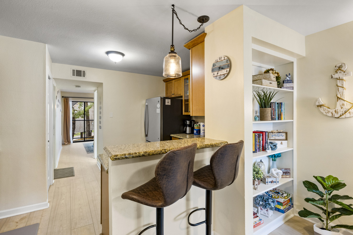Bright kitchen with breakfast bar seating for two