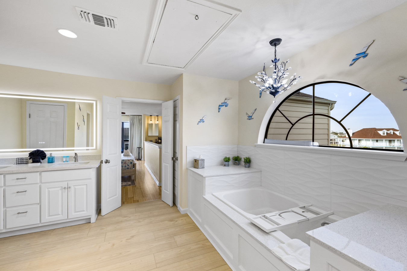 Spa-inspired bath with soaking tub and modern finishes