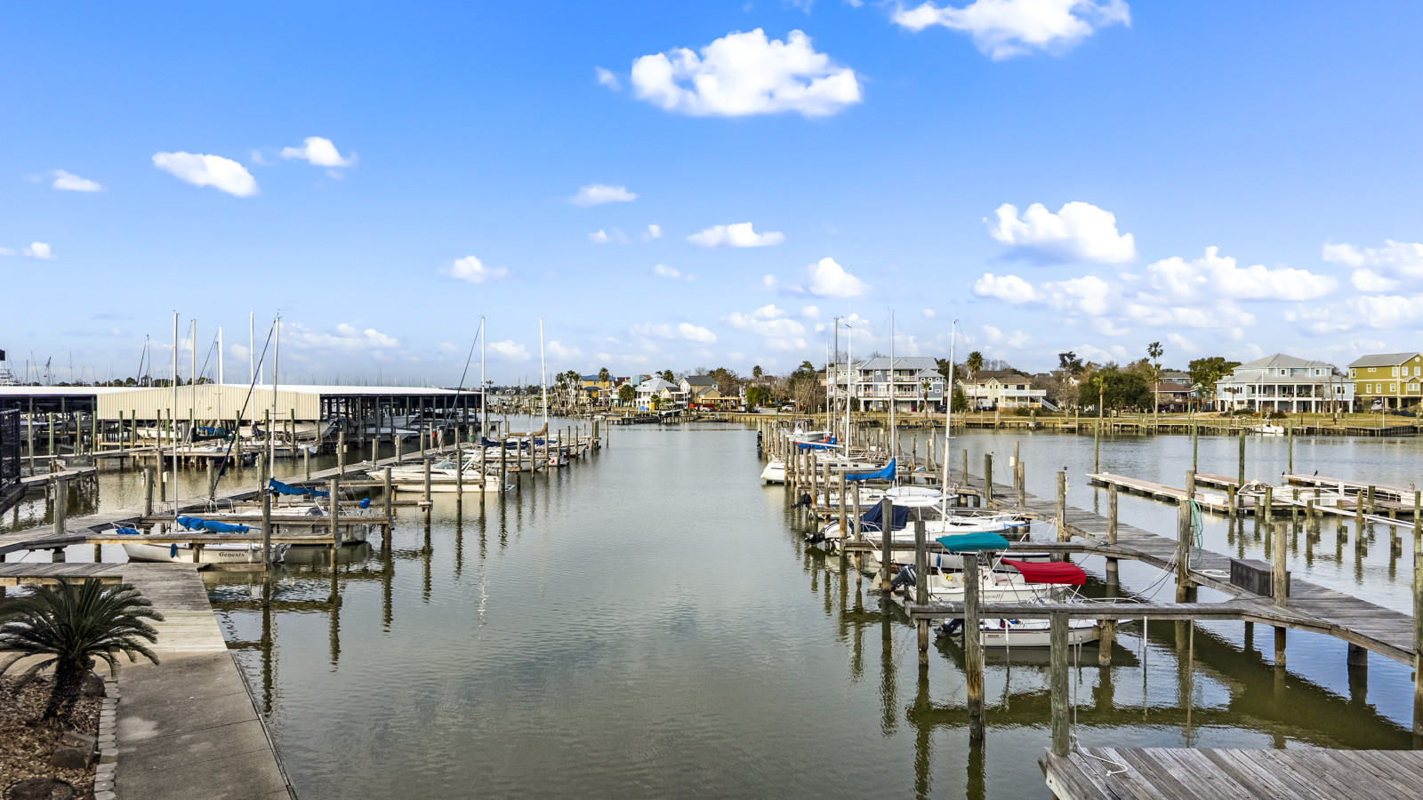 Coastal living with boats, bays, and beautiful sunsets