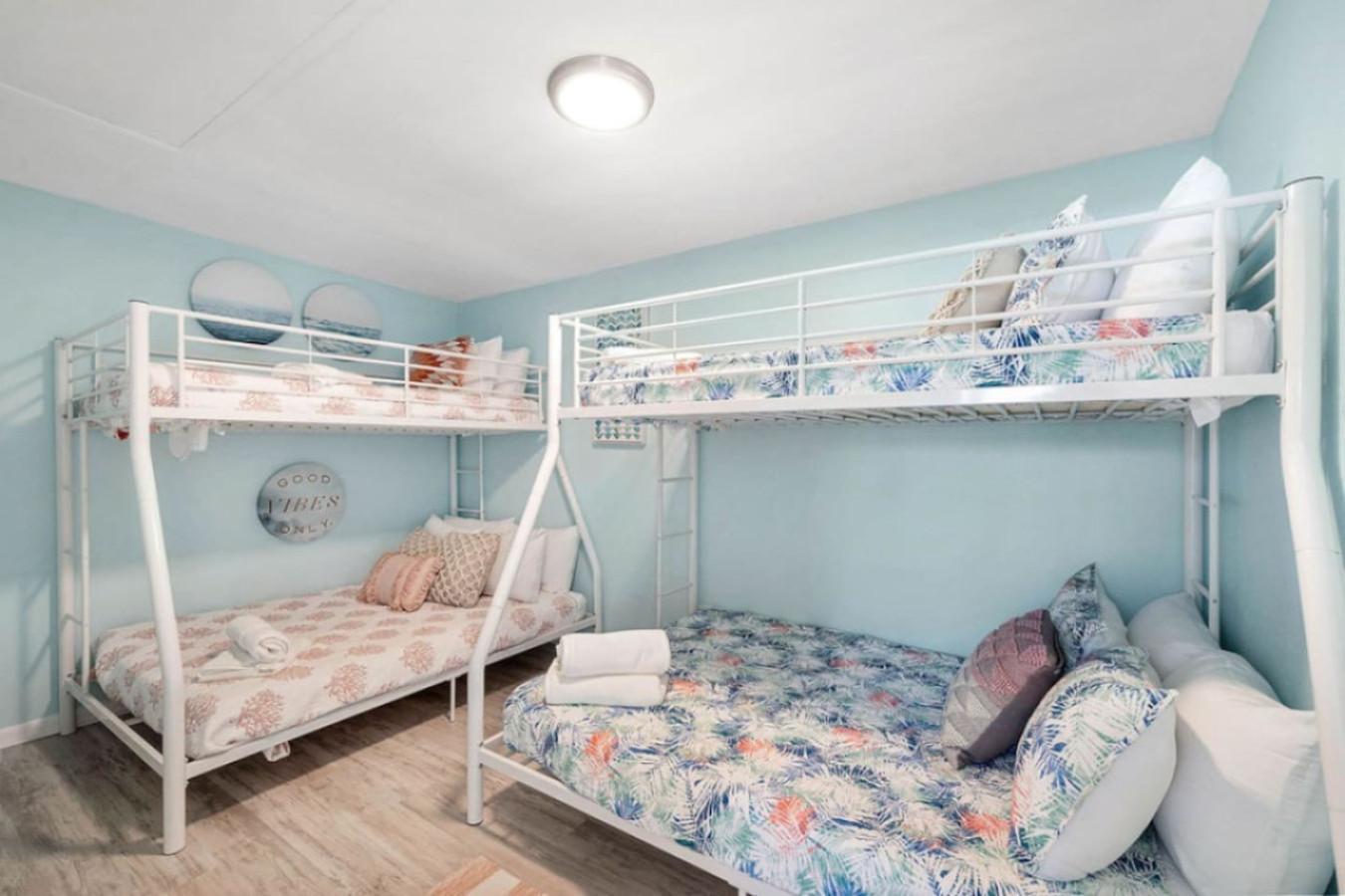 This bedroom has 2 full-over-twin bunk beds