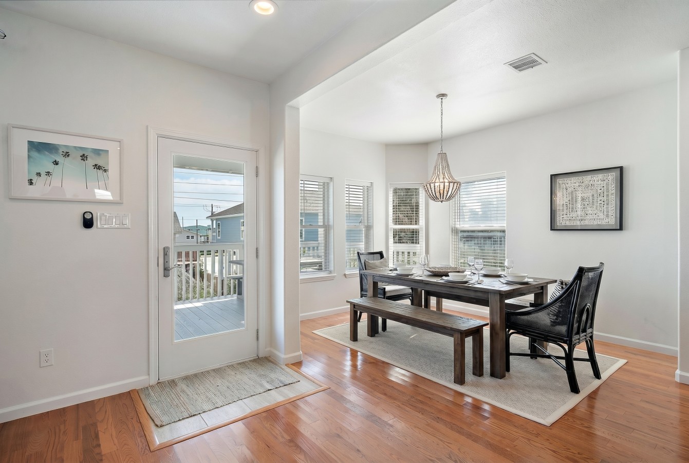 This dining area is located next to the kitchen
