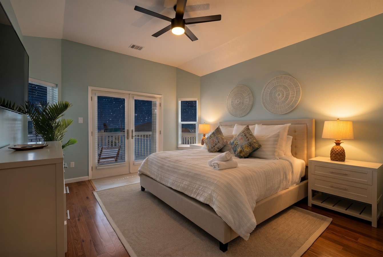 The master bedroom on the third-floor is stunning— with a private balcony