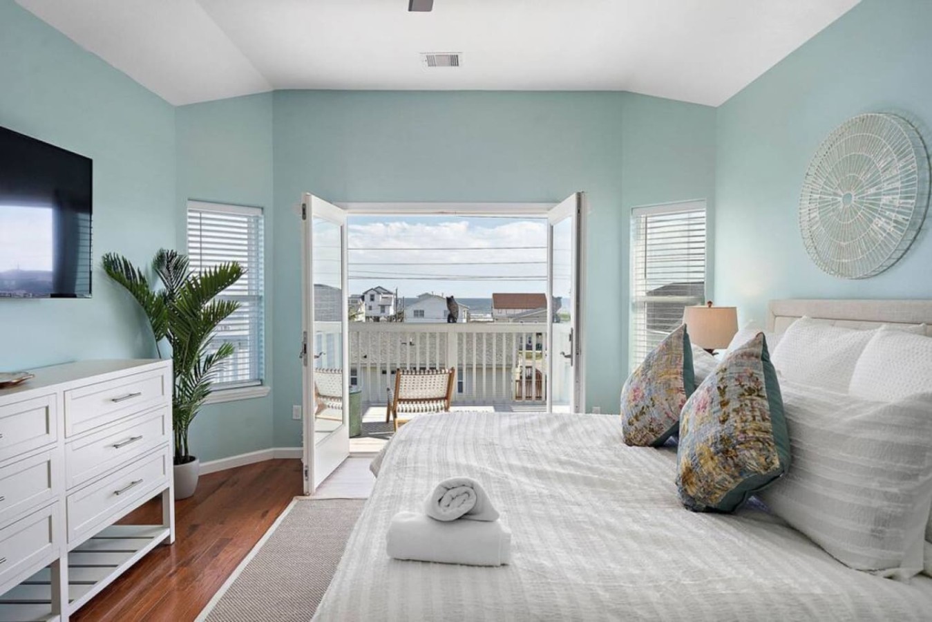 Throw open the doors to your private, third-floor balcony