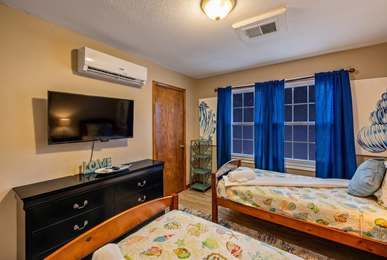 Relax & recharge in this inviting bedroom